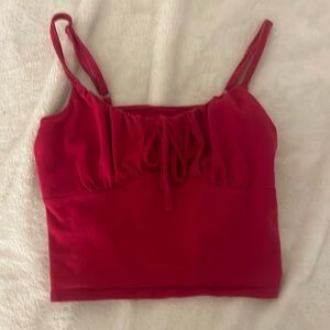 red hollister top with tie and scrunch in the front